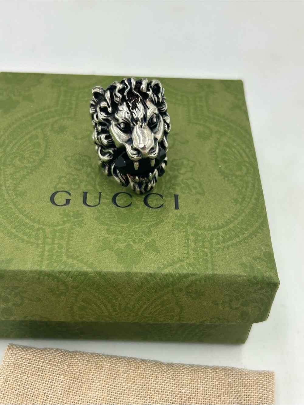 Unisex Gucci, Silvertone, Lionhead motif ring with black crystal size 6